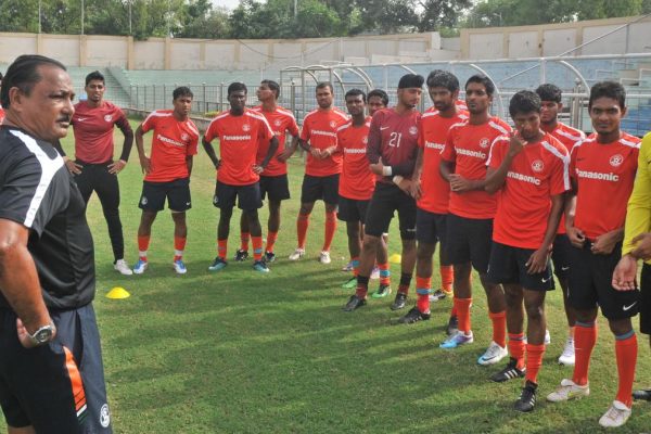 05 Football Coach 02 07 Del.jpg