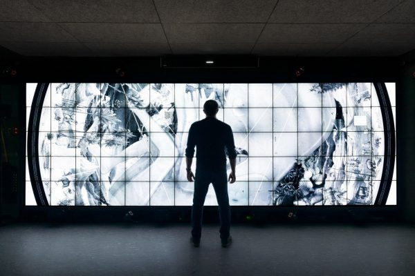 2 Benoit Faiveley Founder Looking At The Life Disc On Wilder Images Wall At Inria Paris Saclay. C.jpeg