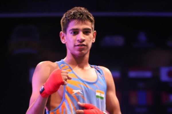 Aman20siwach206320kg20strikes20a20pose20at20asian20u 152020u 1720boxing20cships20in20.jpeg