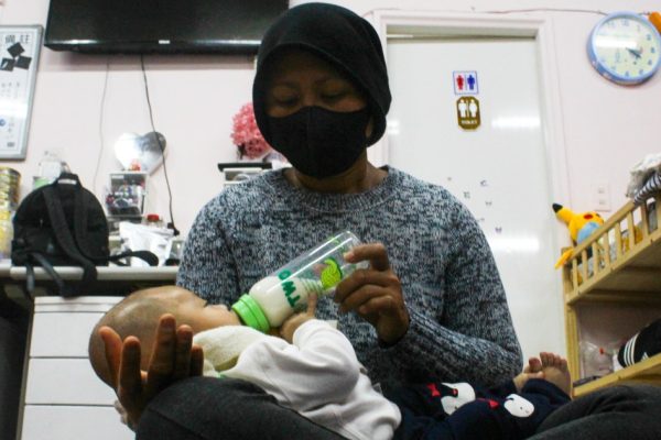 Migrant nanny feeds baby 1751871950 24b805 1751873444.jpg