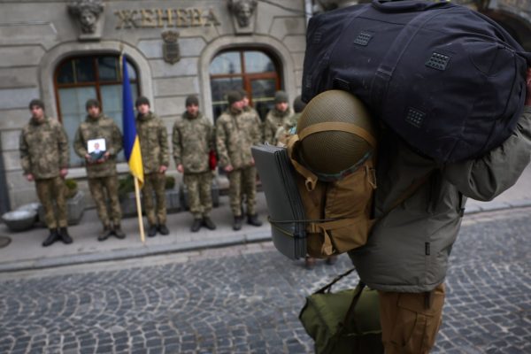 2022 03 16t113900z 1093649701 rc2k3t9craja rtrmadp 3 ukraine crisis lviv funeral 1762490213.jpg